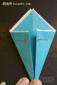 步骤10:另一侧的两个角以上面的方法折到里面去压平