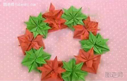 步骤31:全部连接好后，圣诞花环折纸就做好了。怎么样，很美吧~圣诞节马上就到了，也赶紧做一个吧！