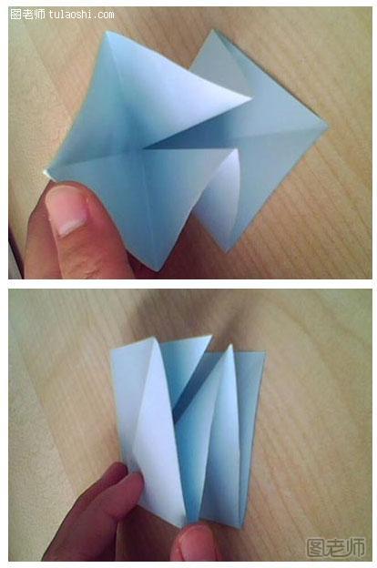 过程2:以一个小正方形为低，沿着折痕叠成如图所示的状况，用手按下，是一个正方形。