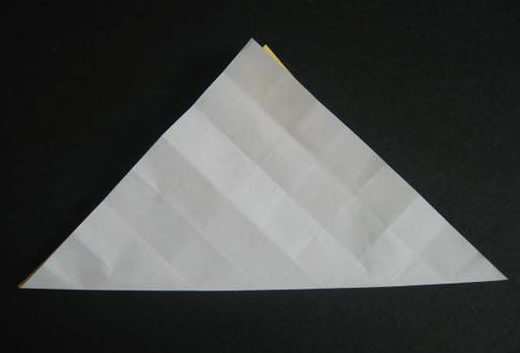 过程4:翻开纸，对角折。