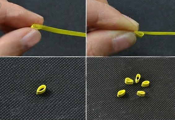如何制作圣诞树耳环 衍纸圣诞树耳环手工DIY教程黄色的衍纸制作出5个3mm的花瓣，这可是个精细活，耐心的做吧