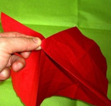 过程20:在实践折叠顶用手辅佐的折叠方位。